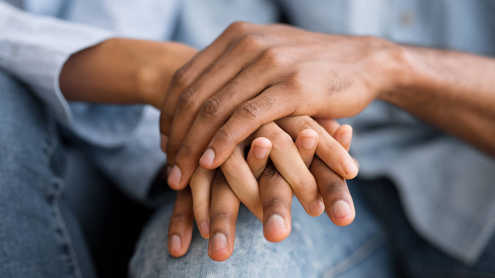 Image of a couple holding each others hands. Begin working with a skilled EMDR therapist in Wake Forest, NC to help you and your partner rebuild trust after betrayal.