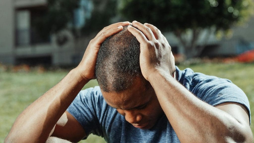 man upset because of trauma memories